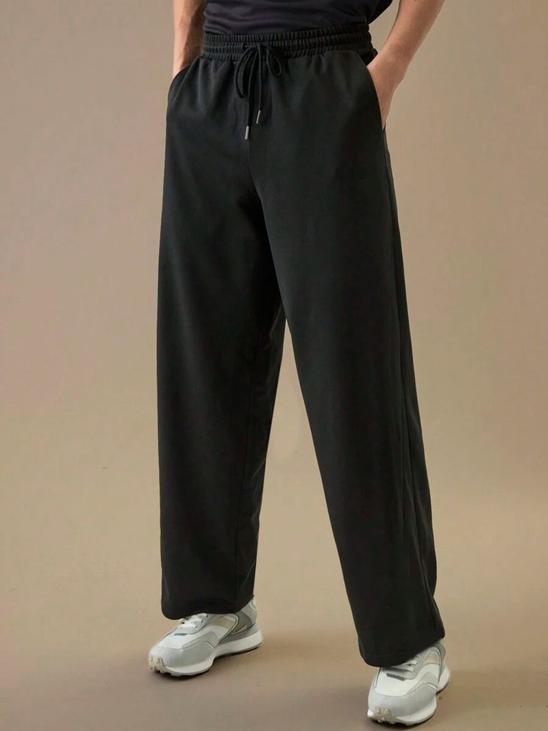 فلاينوف بنطلون رياضي رجالي كوري أسود بقصة فضفاضة - Image 2